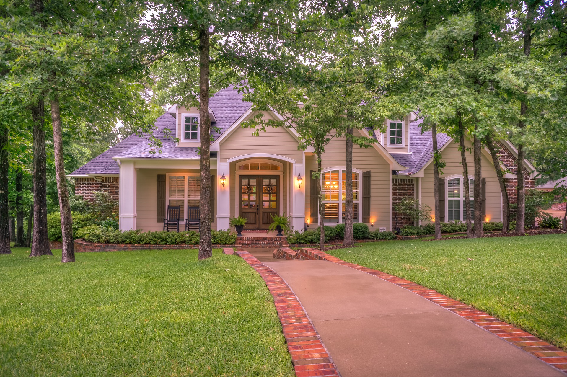 Photo of House in a tranquil setting, surrounded by trees